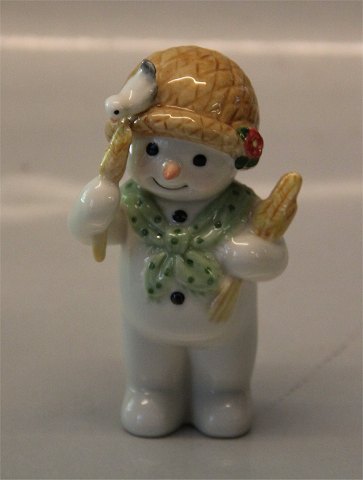 Royal Copenhagen figurine 0529 RC Winther series, Snowman, Mother Sophie with corns for the birds 9 cm (1249529) Henny Iversen 2008