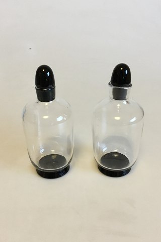 Orrefors Simon Gate Two small Bottles of glass with black base and cork of black glass