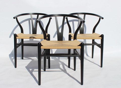 Set of three Wisbone Chairs - Model CH24 - Black Painted Wood - Natural Wicker - 
Hans J. Wegner - Carl Hansen & Søn
