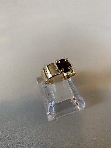 Ladies ring with inlaid smoke topaz in 14 Karat GoldSize 64