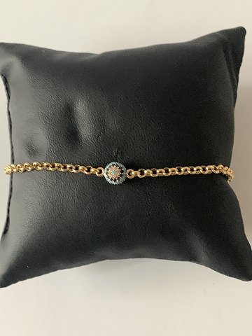 Gold chain in 14 carat gold, with turquoise and blue sapphires and inlaid brilliants. Stamped 585.