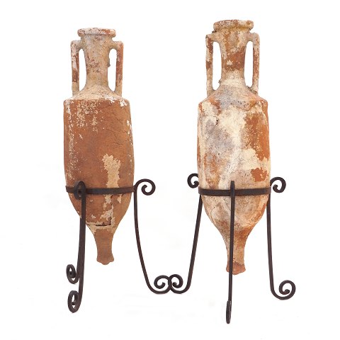 Pair of early Roman Amphoras circa 1st century. 
Iron stands. H: 123cm