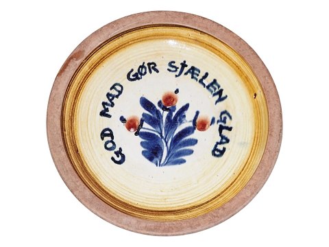 Hugo Munk Hansen keramik
"GOD MAD GØR SJÆLEN GLAD" fad med gul dekoration