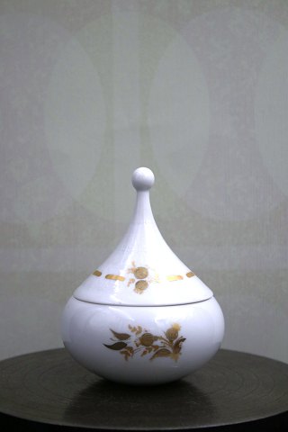 Small Rosenthal Bjorn Wiinblad lidded jar in white porcelain with gold 
decorations...