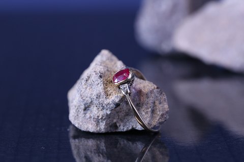 14 carat gold ring with red faceted ruby ​​and diamonds. Stamped 585.Ring size 55.