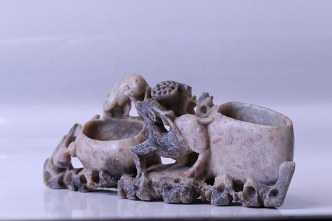 Table sculpture made of soapstone with a beautifully detailed animal motif and 
two compartments.