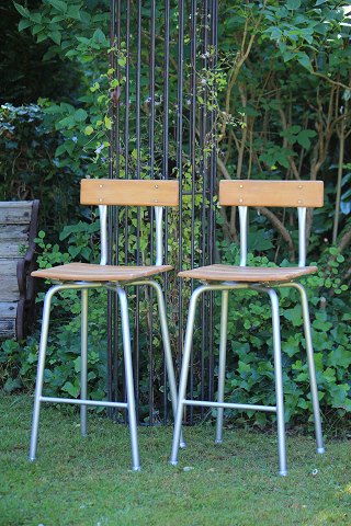 Bar stool / high stool with back from the 60s in metal 
with seat and back in wood...