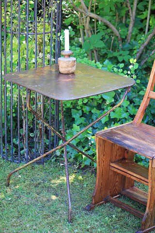 Old French café table in polished metal and wrought iron with a really nice 
patina...