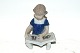 RC Figurine, Else reader, Girl seated with bookDek. No. 674