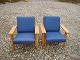 A couple of lounge chairs designed by Hans Wegner GE model 290 with blue wool fabric made ​​from getams furniture factory in good condition 5000 Showroom