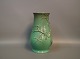 Vase with mint green glaze, with motif of a bird sitting in a tree. 5000m2 showroom.