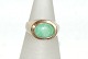 Gold ring with green stone
Size: 60