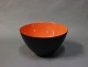 Krenit bowl by Herbert Krenchel in Black metal and orange/red enamel. 5000m2 showroom.