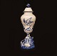 A blue decorated rabbit vase of faience. Signed Marieberg, Sweden, 03.10.1772. H: 37cm