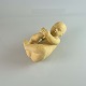 Sandsten figur
Liggende baby
