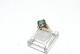 Ladies ring with green stone 14 carat gold
Size 55
