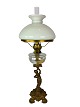 Kerosene lamp of patinated metal and shade of white opaline glass from around 
1860. 
Great condition
