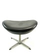 Foot stool for the Egg, model 3127, upholstered in black elegance leather, designed by Arne Jacobsen in 1958 and manufactured by Fritz Hansen in 1998.5000m2 showroom.