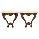 Pair of partly gilt Rococostyle console table with imitated marble wooden tops. 
Denmark circa 1850. H: 77cm. Top: 70x48cm