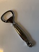 Konge / Acorn Bottle opener / Opener.
Manufactured by Georg Jensen.
Length 11,5 cm