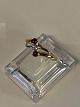 Ladies ring with brilliant and rubies in 14 carat red/white goldSize 58