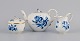 Meissen, Germany, teapot, creamer and sugar bowl.Hand painted in blue with flowers and insects. Gold decoration on rims.