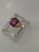 Gold ring with purple stone in it
18 carat Gold
Size 56