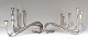 Michelsen. Sølv lysestage (925). Et par. Design Ibi Trier Mørch. Højde 16,5 cm. Længde 24 cm. Produceret 1953 (C9) + 1956 (F9)