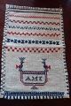 An antique Sampler, handmade red and blue embroider 25cm x 17cmIn a good conditionWe have a large choice of samplers, embroider Please contact us for further information