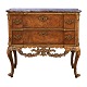 Walnut veneered and partly gilt marble top commode made by the manufacture 
Köster, Altona, Northgermany, circa 1770. H: 78cm. Top: 85x43cm