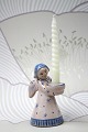 L. Hjorth glazed ceramic angel holding a small candle. H: 9,5cm.