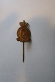 For the collector:
Old lapel (for the king)
Made in metal vith the letters CX
Made with a model drawed from Poul Søbye, Denmark 
(1889-1965)
Dated: 26.9.1940
L: 4cm
In a very good condition