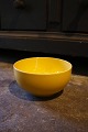 Royal Copenhagen 4 All Seasons faience bowl with yellow glaze designed by Grethe 
Meyer. 
No. 576...