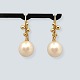 Dulong; Pair of Delphis Pearl earrings in 18 kt. gold with pearls