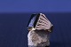 Herrering i 18 karat guld, med sort onyx. Stemplet 750. Ringstørrelse 63,5