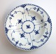 Royal Copenhagen. Blue fluted, half lace. Deep plate. Model 566. Diameter 21.5 
cm. (1 quality)
