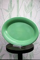 Ursula faience oval serving dish from Royal Copenhagen designed by Ursula 
Munch-Petersen with light green glaze. 621..