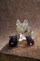 Decorative small dogs in colored glass with collars...