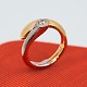 Ole Lynggaard; Ring of 14k gold and white gold, set with a diamond