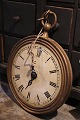 Decorative old 
wooden "clock" 
from a 
watchmaker's 
shop ...