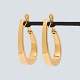 Pair of large earrings in 18k gold