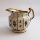Lundin Antique presents: Royal Copenhagen. Henriette. Creamer. Model 444-8564. Height 9 cm. (1 quality).