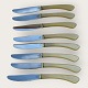 Jens H. Quistgaard8 pcs. Knives with light plastic handles*550 kr total