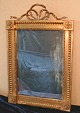 Old mirror with gilt frame and facet cut glass, from mid 1900 century