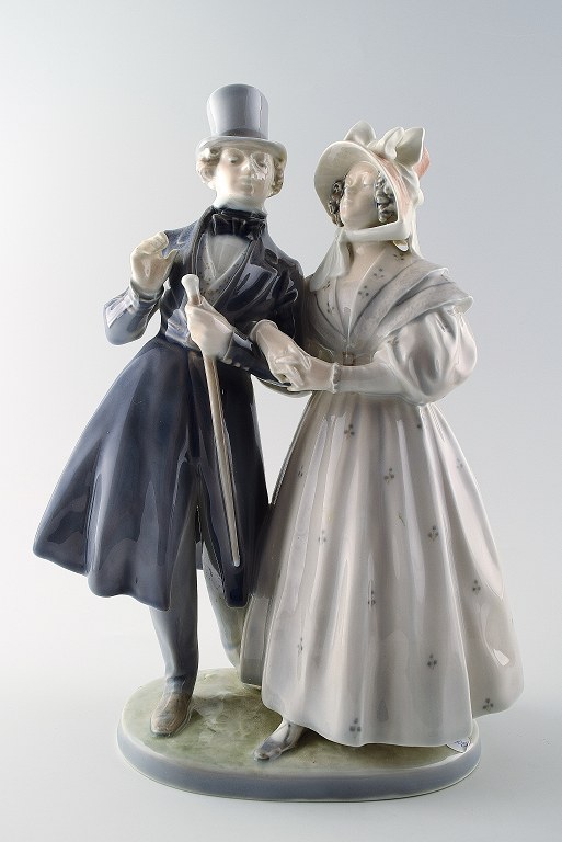 Large Royal Copenhagen figurine, "Evening walk in Tivoli gardens".