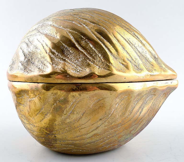 Brass box in the form of a nut.