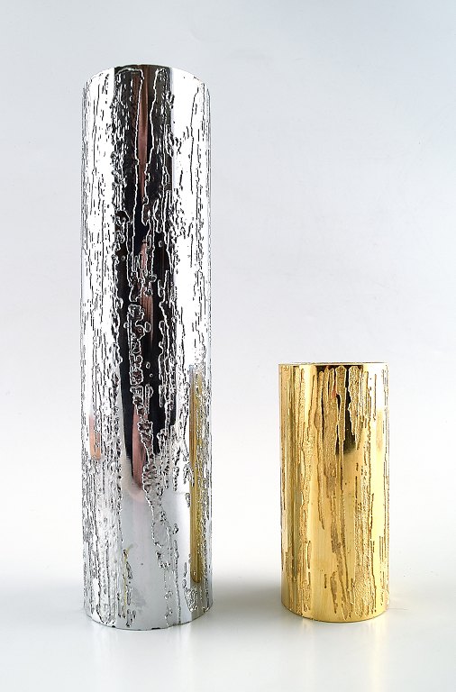 2 modern design metal vases, silver and gold.Selected by the Museum of Modern Art, NY.
