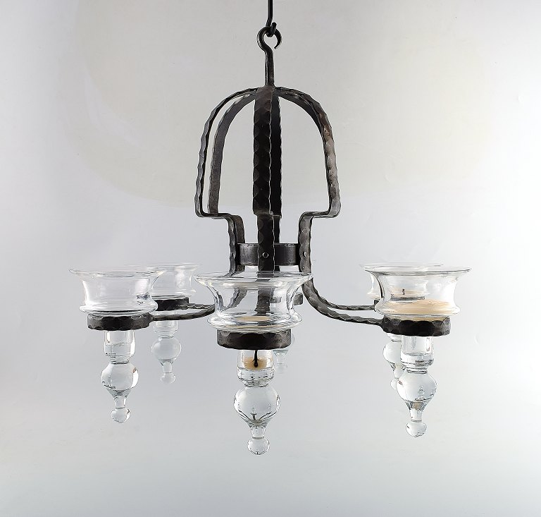 Erik Höglund for Kosta Boda. Sweden 60 / 70s.Six armed chandelier made of cast iron.