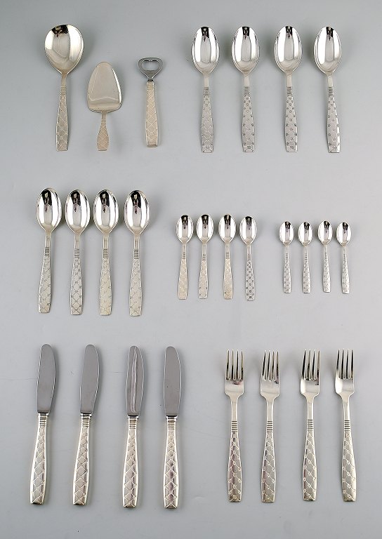 Jens Quistgaard 1919-2008. Star. Silver plated cutlery.Danish design mid 20 c.Consisting of 27 pieces for 4 persons.