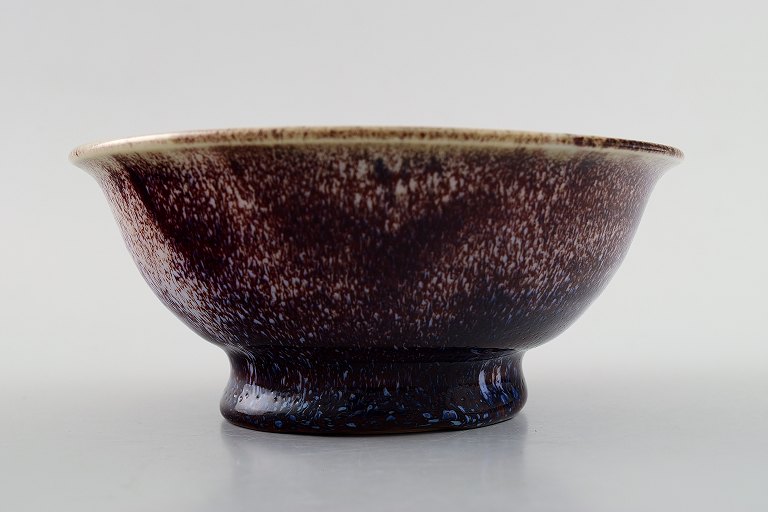 Scandinavian ceramist, art pottery bowl with purple glaze.